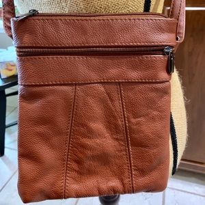 Brown crossbody purse.